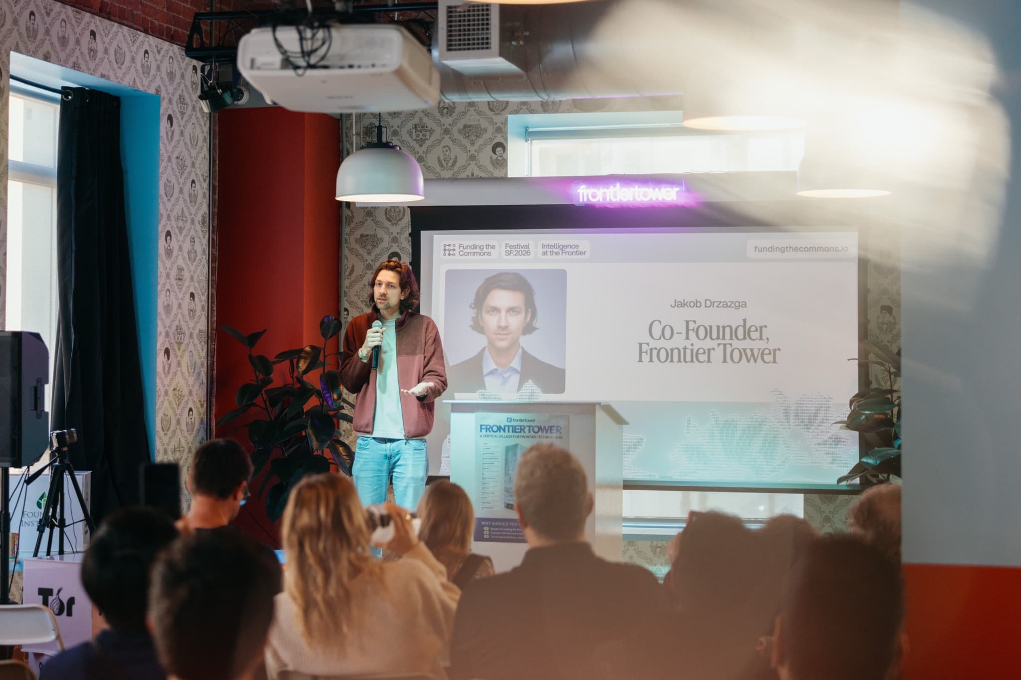 Co-founder presenting at Frontier Tower Spaceship