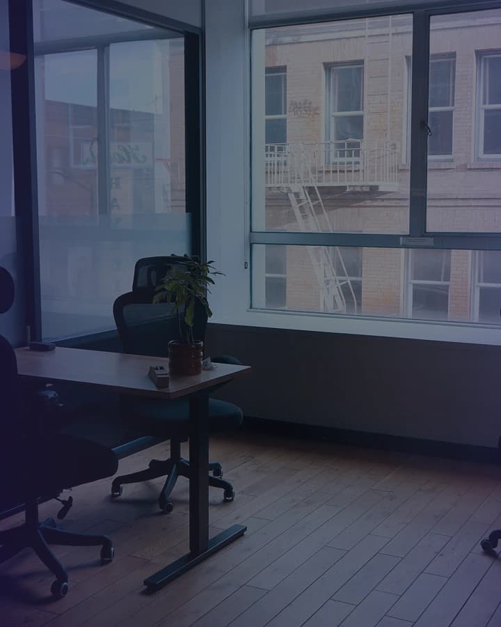 Private office with desk and natural light at Frontiertower.
