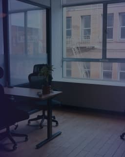 Private office with desk and natural light at Frontiertower.